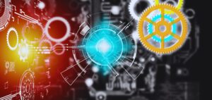 Isinet Consulting Rappresentazione digitale di ingranaggi e interfacce tecnologiche luminose, simbolo di innovazione industriale e mantenimento dei requisiti 4.0 e 5.0.